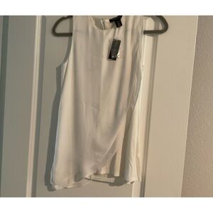 Brand new With tag White House Black Market Blouse color is White